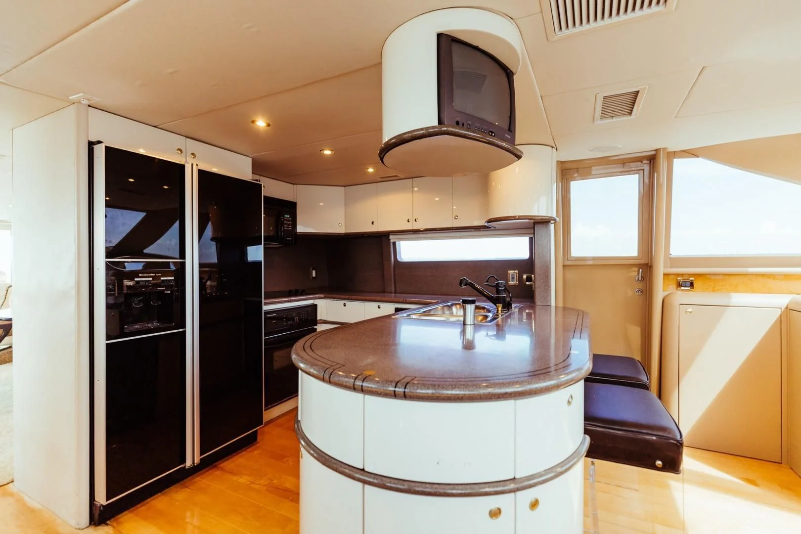 a kitchen with a large island aboard DOUBLE EAGLE Yacht for Sale