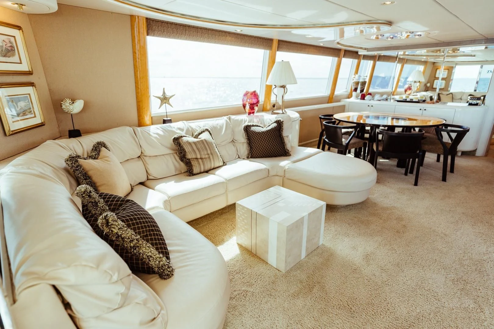 a living room with a couch and a table aboard DOUBLE EAGLE Yacht for Sale