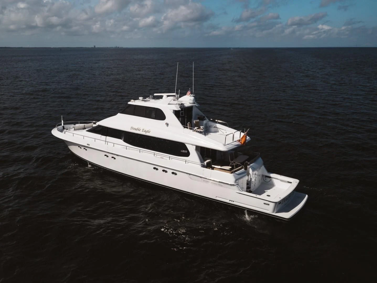 a white yacht in the water aboard DOUBLE EAGLE Yacht for Sale