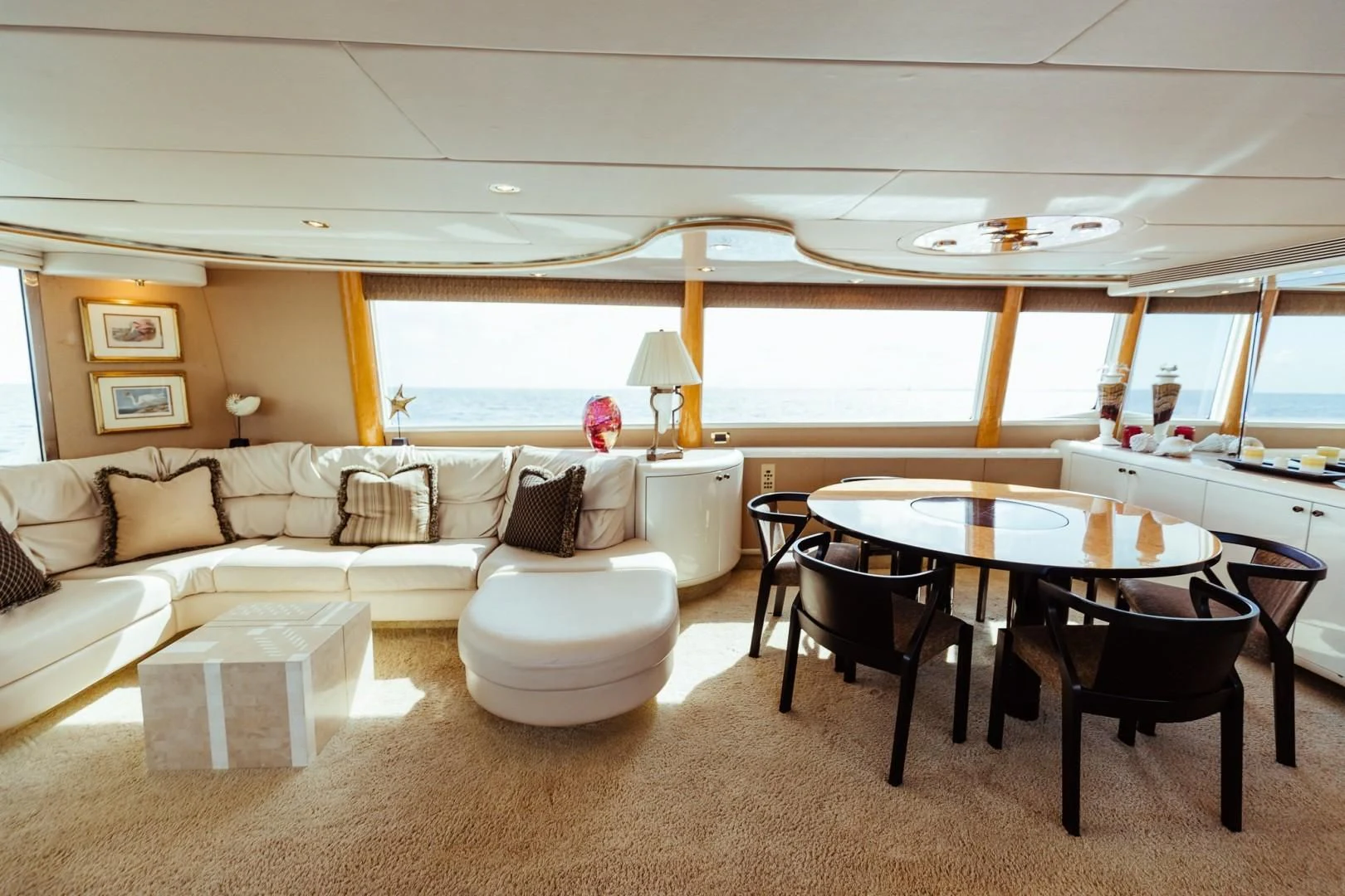 a living room with a couch and a table aboard DOUBLE EAGLE Yacht for Sale