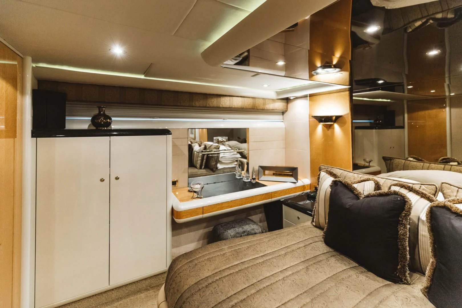 a bedroom with a bed and a sink aboard DOUBLE EAGLE Yacht for Sale