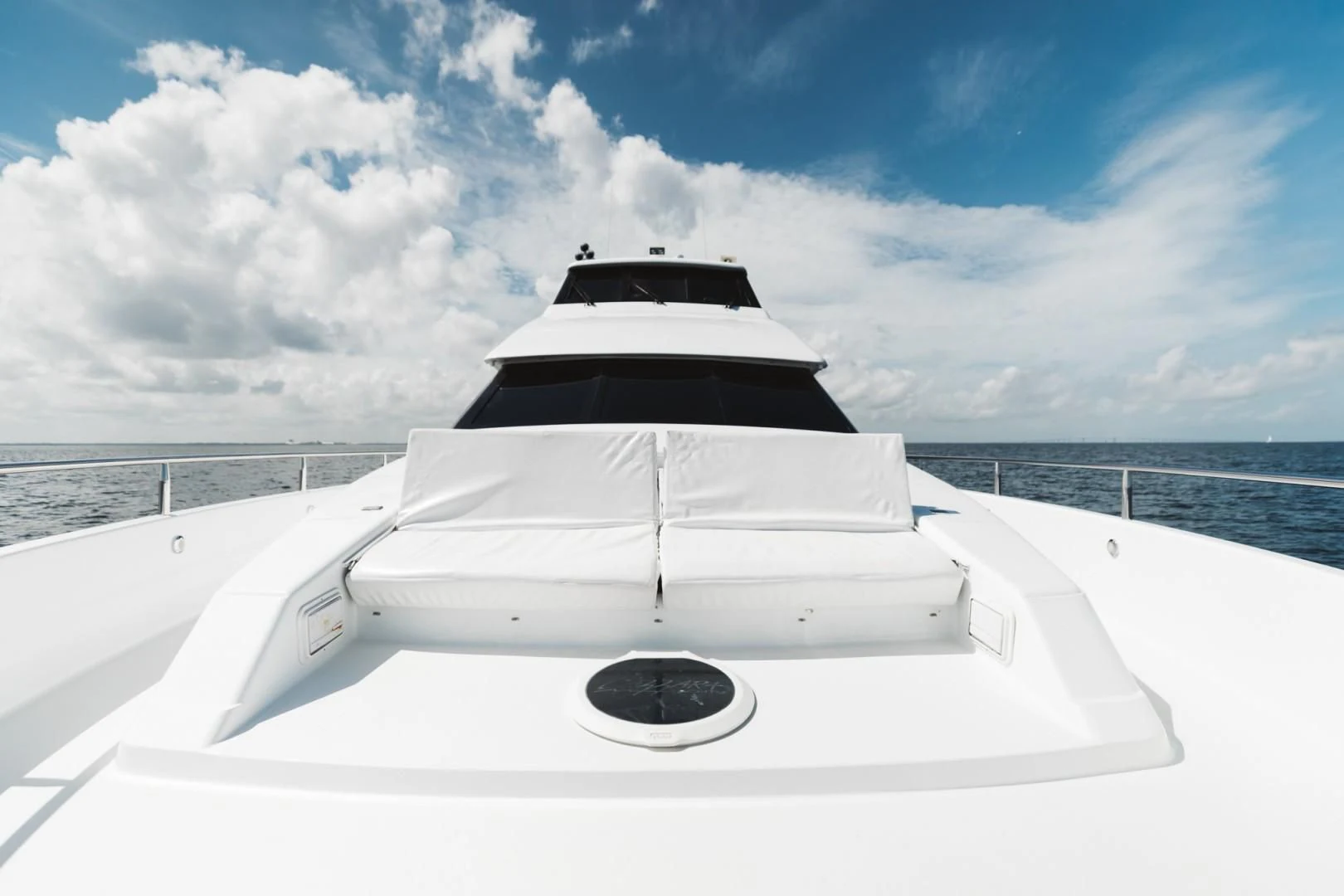 a white boat on a body of water aboard DOUBLE EAGLE Yacht for Sale
