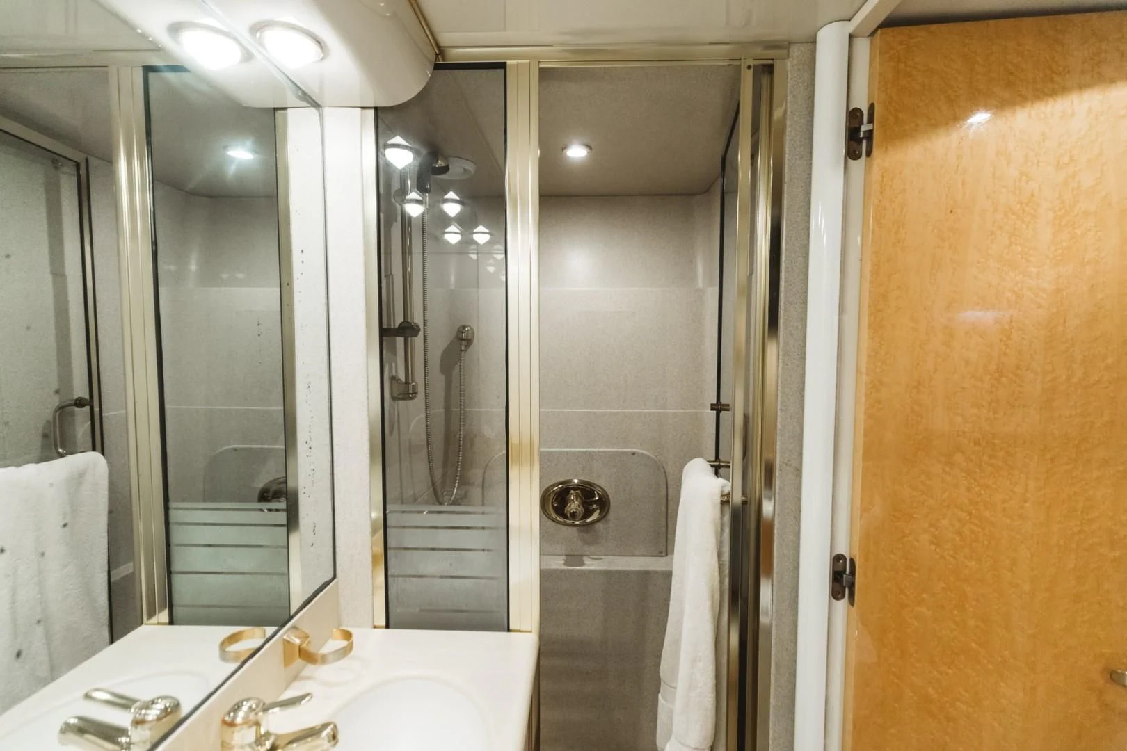 a bathroom with a shower and sink aboard DOUBLE EAGLE Yacht for Sale