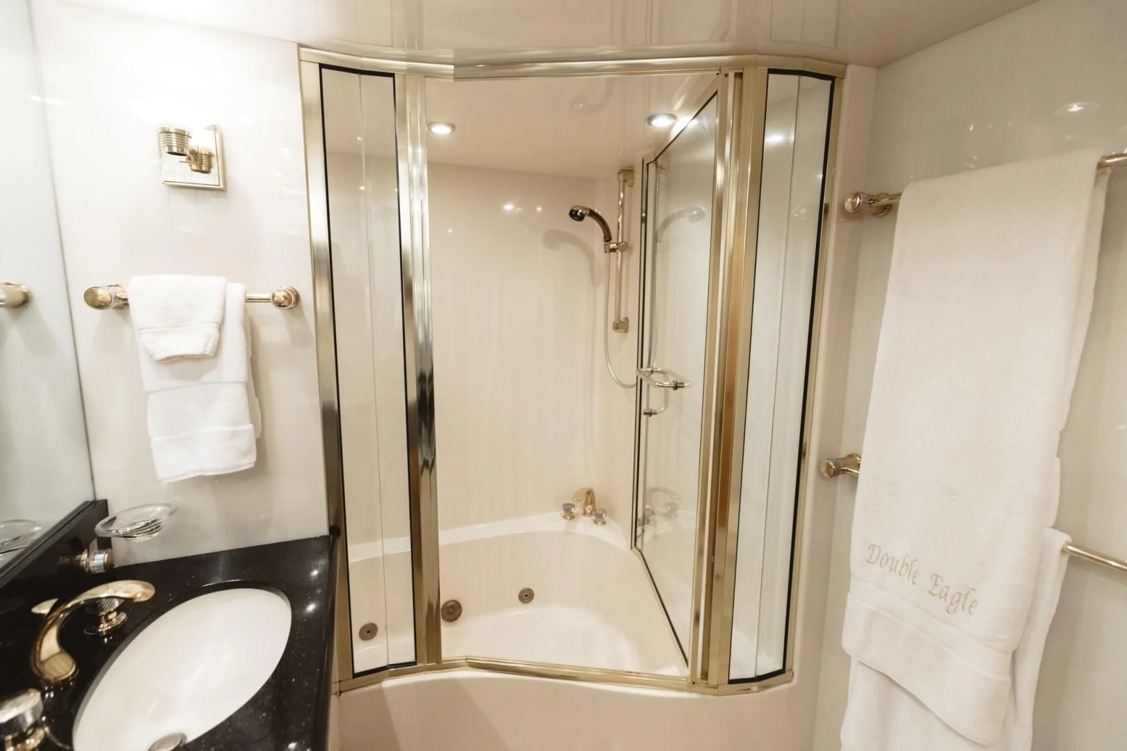 a bathroom with a shower and sink aboard DOUBLE EAGLE Yacht for Sale