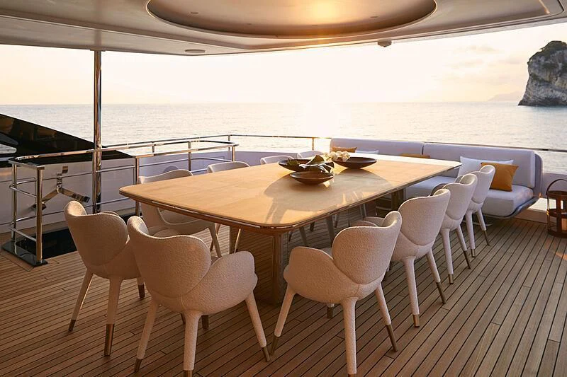 a table with chairs on it aboard SHABBY Yacht for Sale