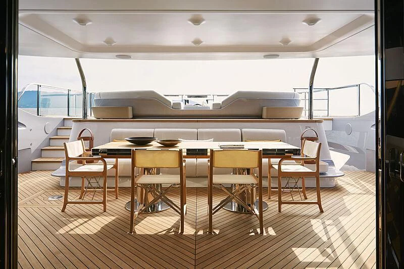 a room with a table and chairs aboard SHABBY Yacht for Sale
