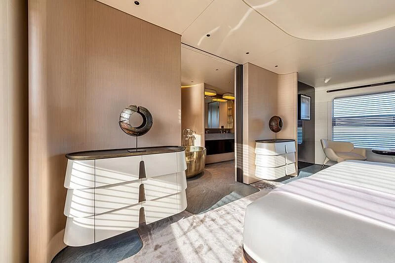 a room with a bed and a mirror aboard SHABBY Yacht for Sale