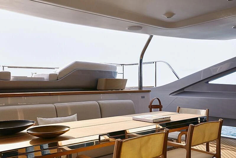 a room with a couch and a table and chairs aboard SHABBY Yacht for Sale