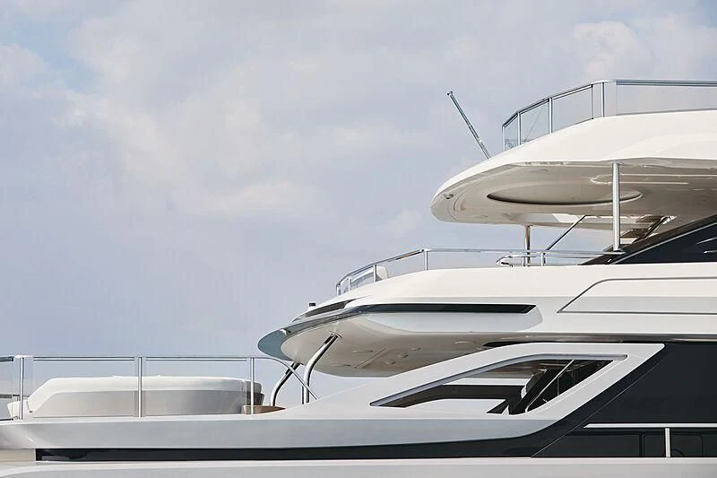 a white yacht on a dock aboard SHABBY Yacht for Sale
