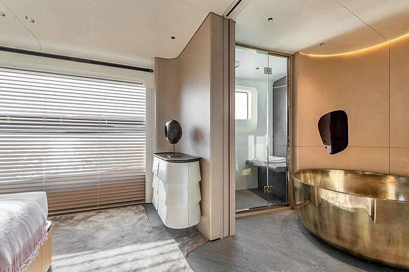 a bathroom with a tub sink and a toilet aboard SHABBY Yacht for Sale