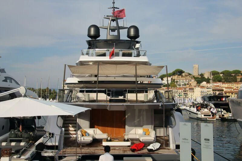 a large ship docked at a pier aboard SHABBY Yacht for Sale