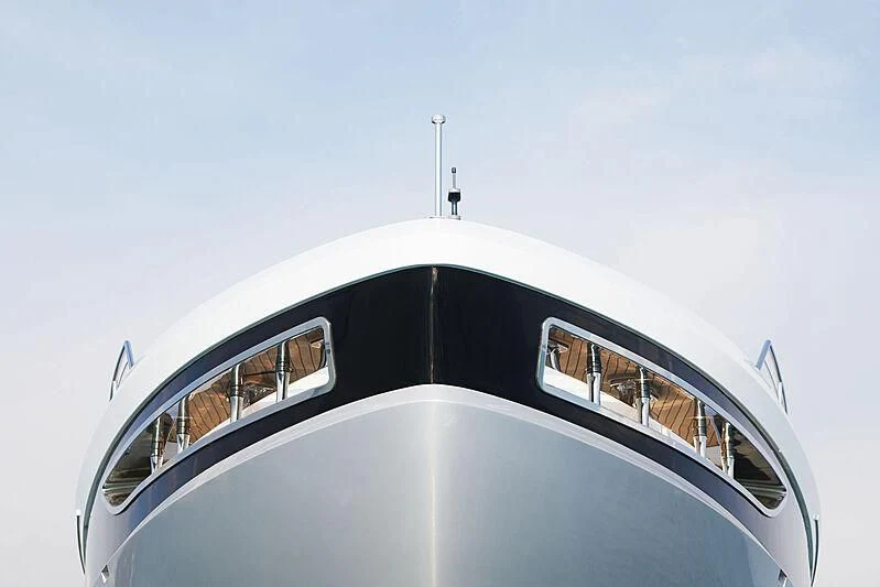 a reflection of a building in a mirror aboard SHABBY Yacht for Sale