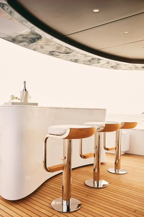 a white table with stools aboard SHABBY Yacht for Sale