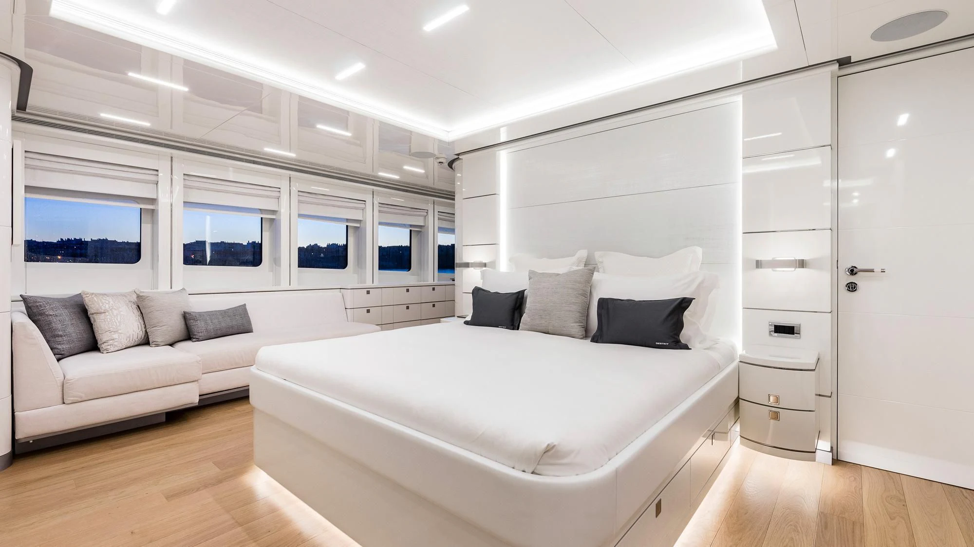 a white bed in a room aboard ANGKALIA Yacht for Sale