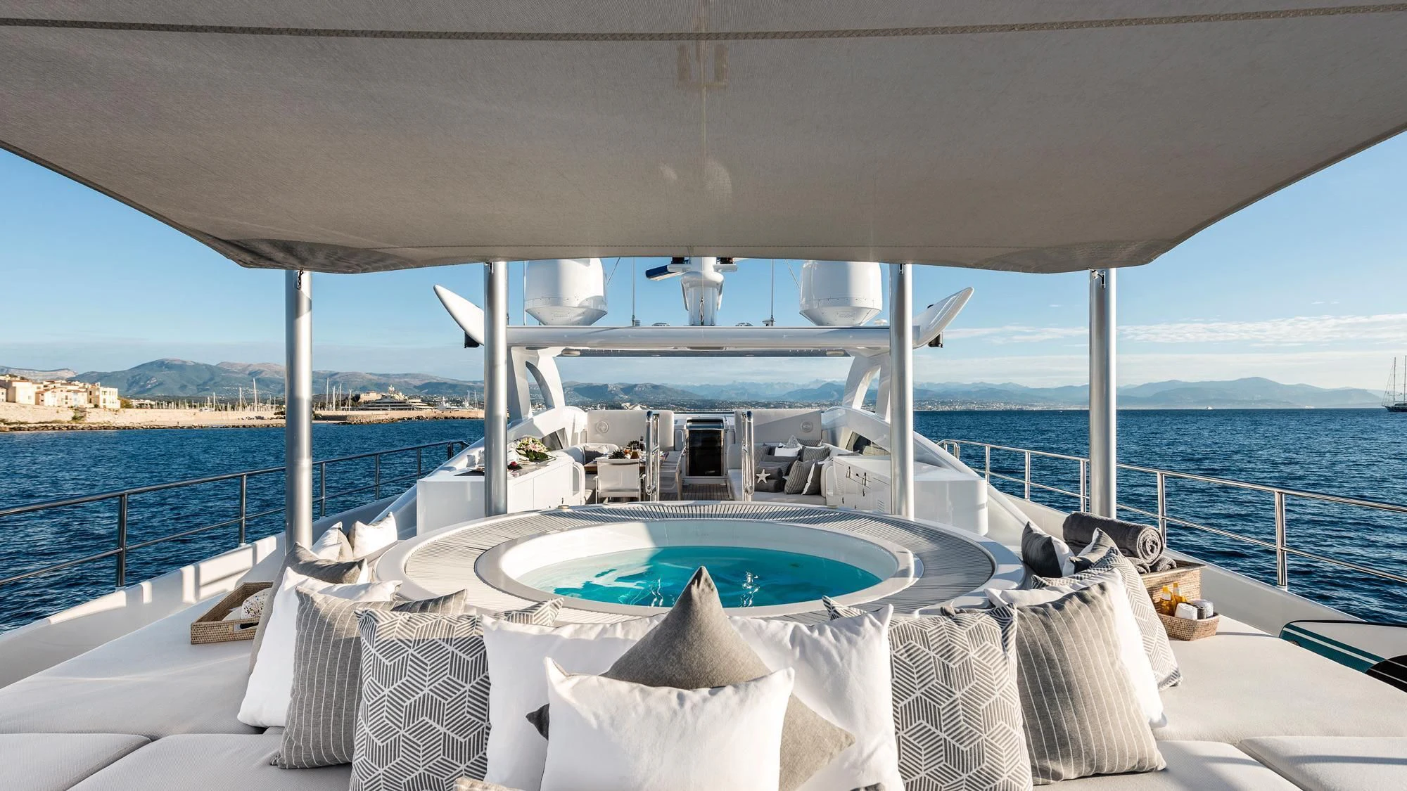 a large white bed on a boat aboard ANGKALIA Yacht for Sale
