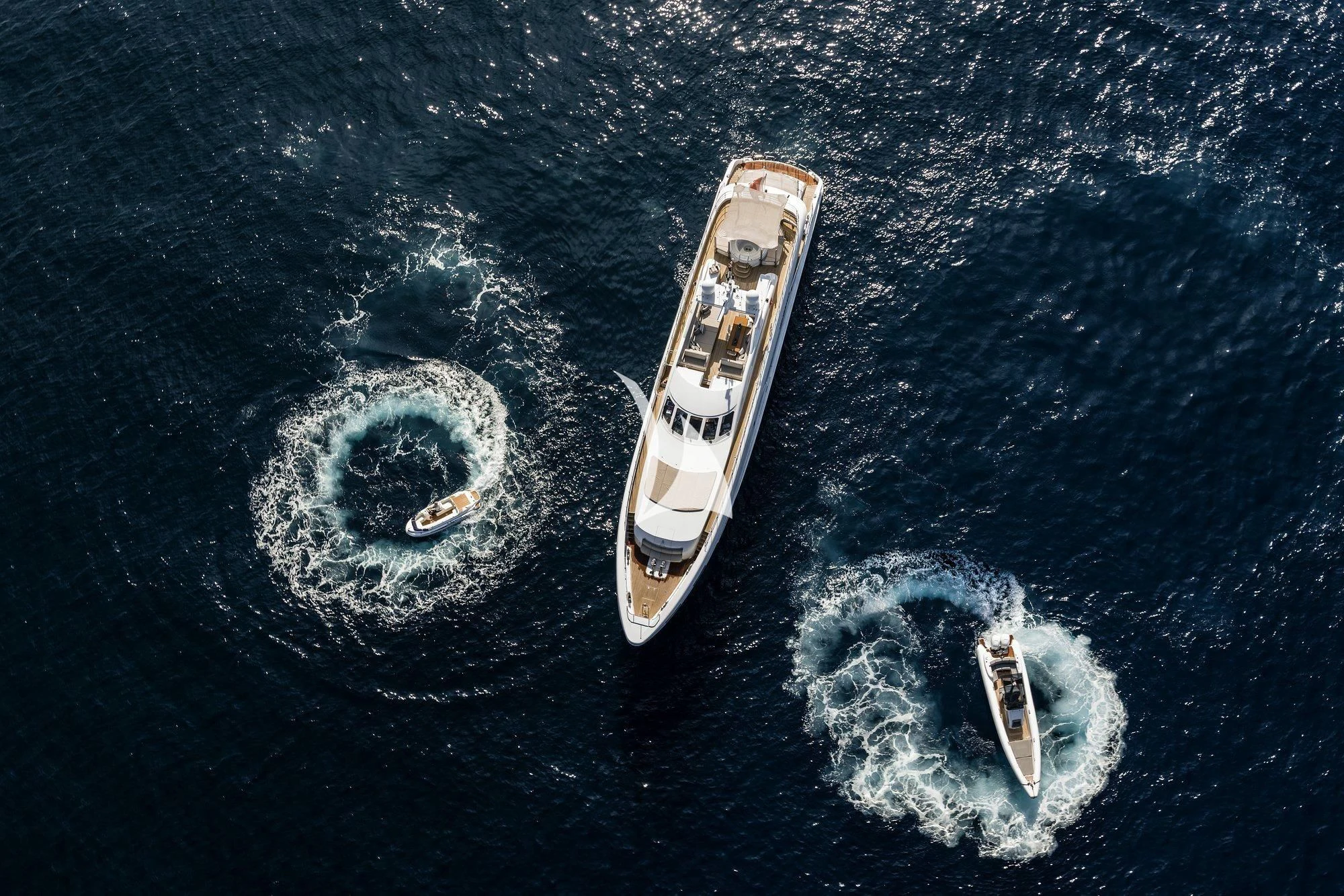 a pair of boats in the water aboard ANGKALIA Yacht for Sale