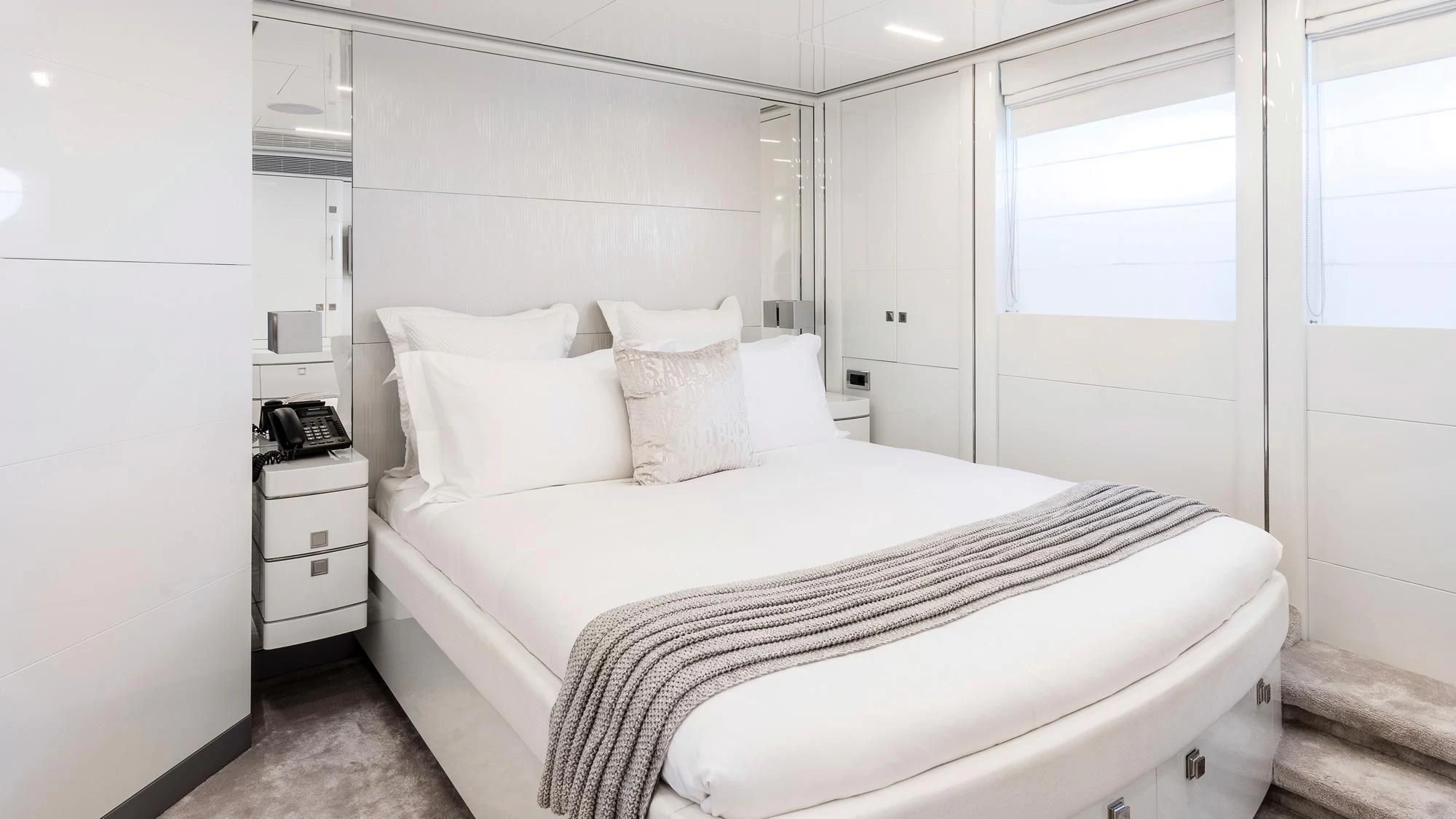 a bed with white sheets aboard ANGKALIA Yacht for Sale