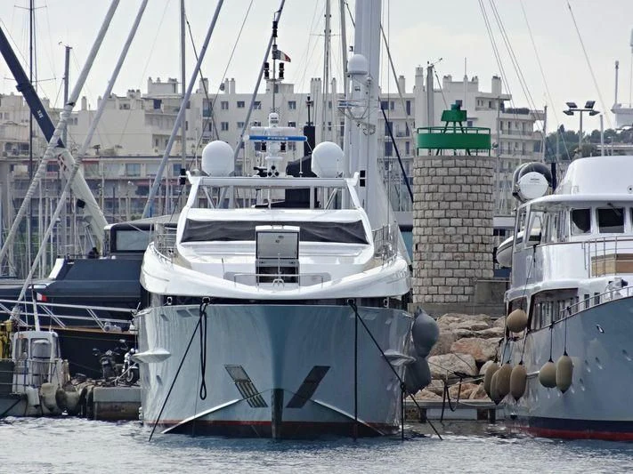 several boats in a harbor aboard ANGKALIA Yacht for Sale