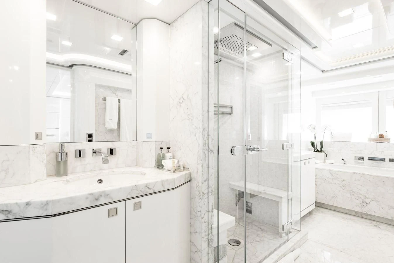 a bathroom with a shower unit and sink aboard ANGKALIA Yacht for Sale