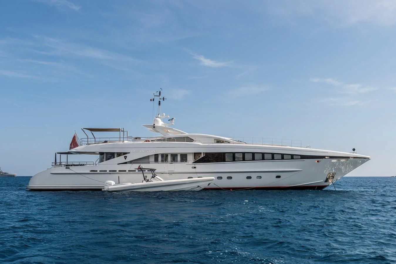 a white yacht in the water aboard ANGKALIA Yacht for Sale