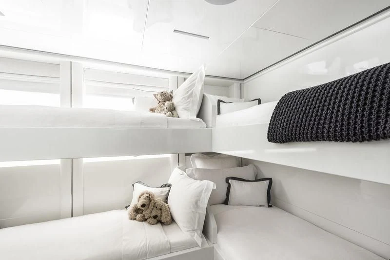 a cat sitting on a couch aboard ANGKALIA Yacht for Sale