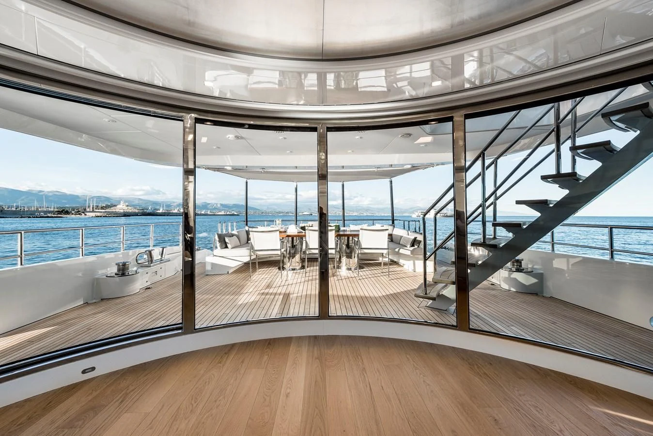 a deck with a view of the ocean and the deck aboard ANGKALIA Yacht for Sale
