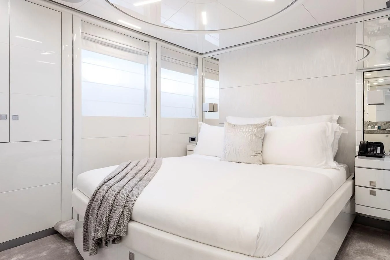 a bed with white sheets aboard ANGKALIA Yacht for Sale