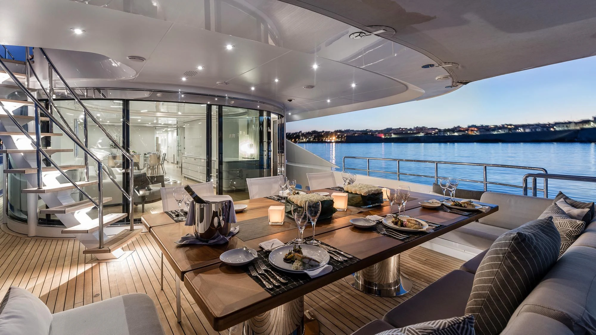 a large living room with a large balcony overlooking the ocean aboard ANGKALIA Yacht for Sale
