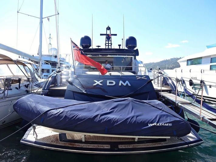 a boat in a harbor aboard AQUILA Yacht for Sale