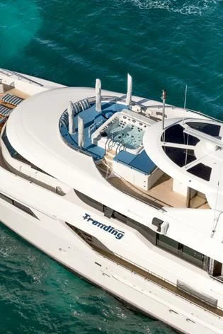 a white boat in the water aboard TRENDING Yacht for Sale