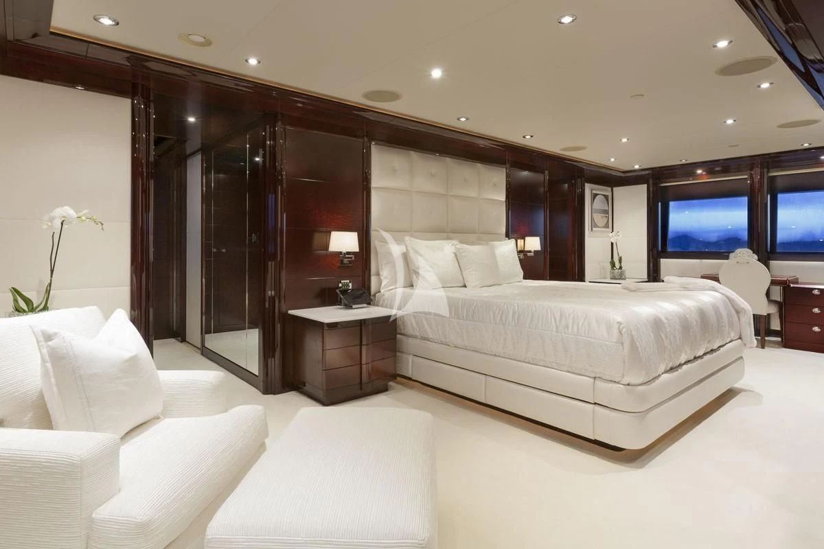 a room with a bed and a tv aboard TRENDING Yacht for Sale