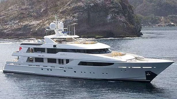 a white yacht on the water aboard TRENDING Yacht for Sale