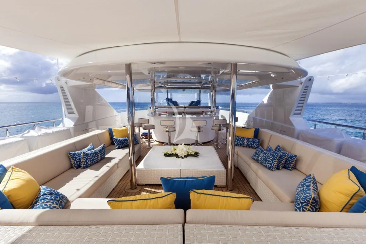 a large living room with a large balcony overlooking the ocean aboard TRENDING Yacht for Sale