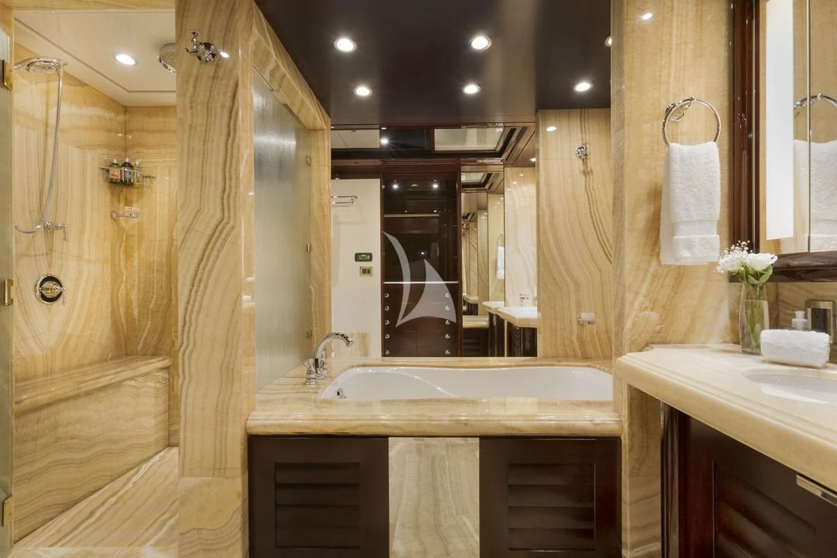 a bathroom with a large mirror aboard TRENDING Yacht for Sale