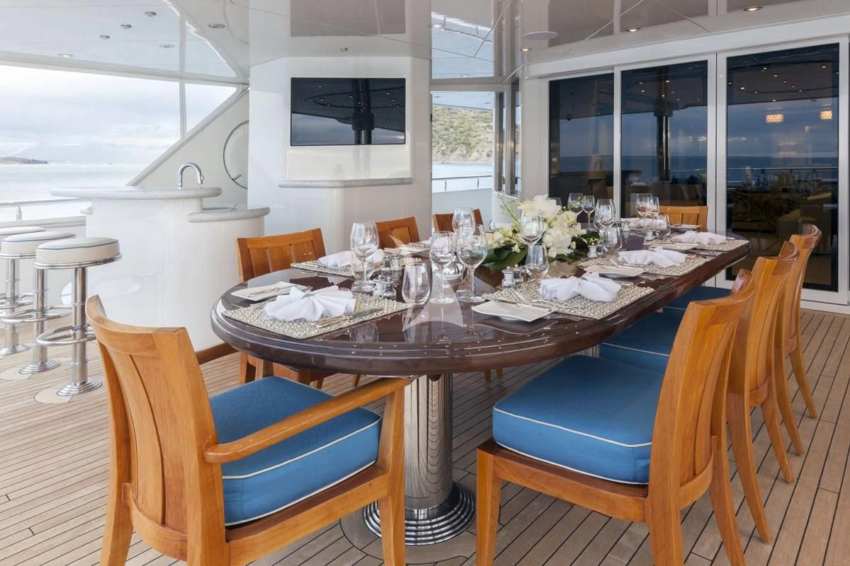 a dining table set for a meal aboard TRENDING Yacht for Sale