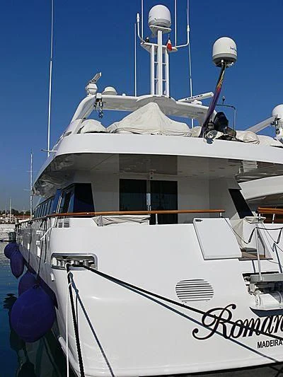 a white boat with a white roof aboard ROMANTICA Yacht for Sale