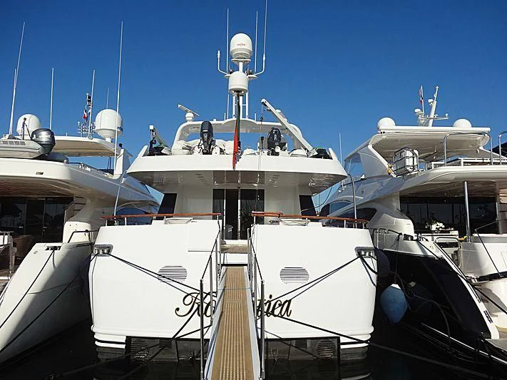 a group of boats are parked in a harbor aboard ROMANTICA Yacht for Sale