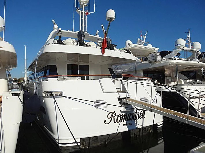 a boat with a white stripe aboard ROMANTICA Yacht for Sale