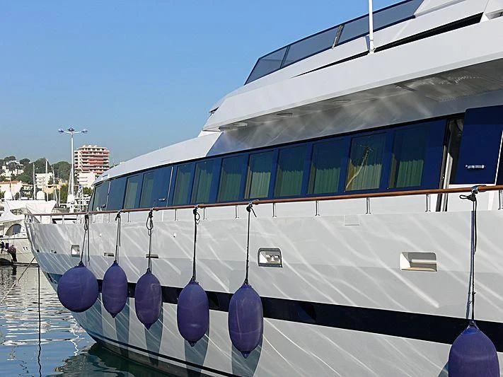 a boat docked at a pier aboard ROMANTICA Yacht for Sale