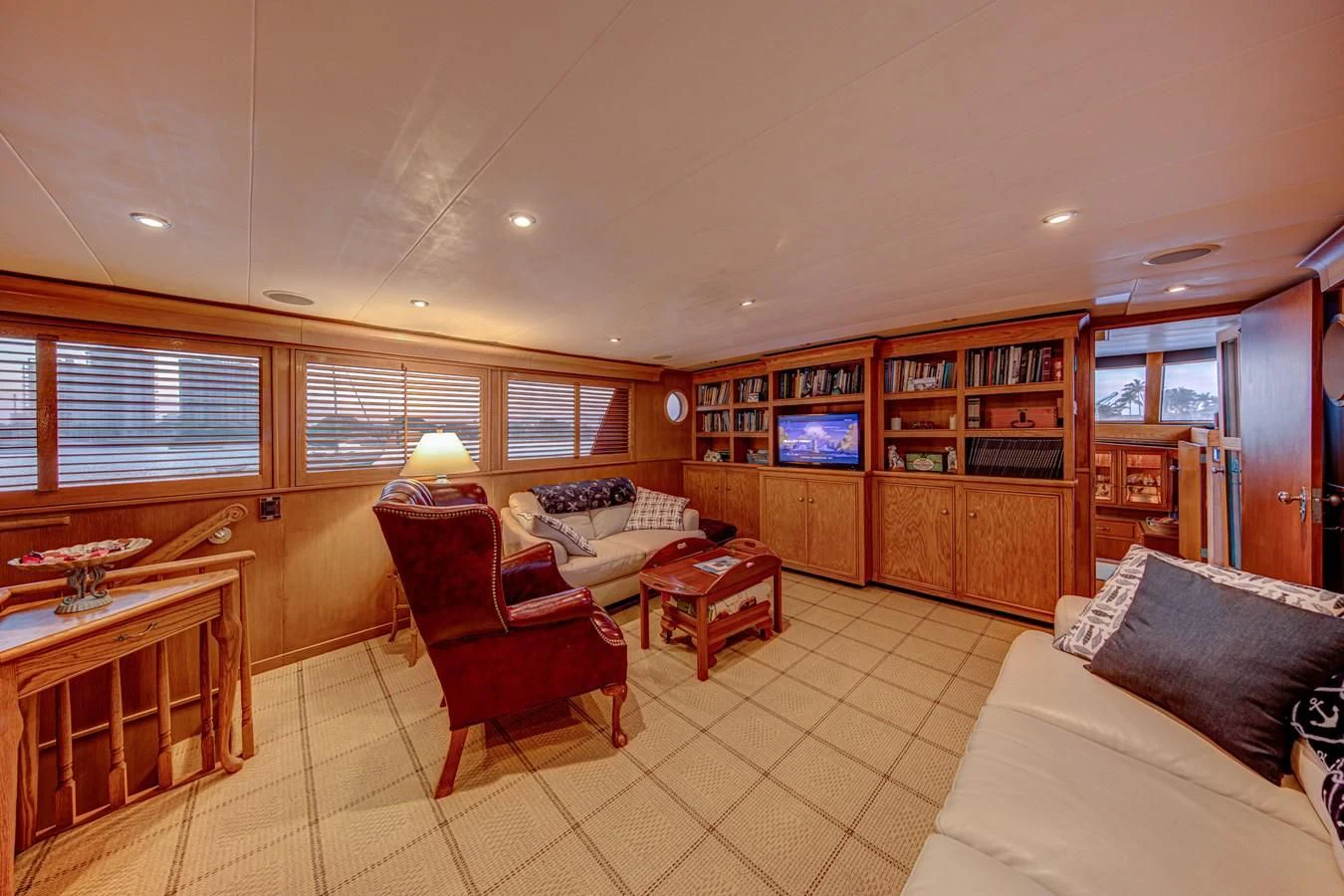 a living room with a couch and a table aboard KOALA Yacht for Sale