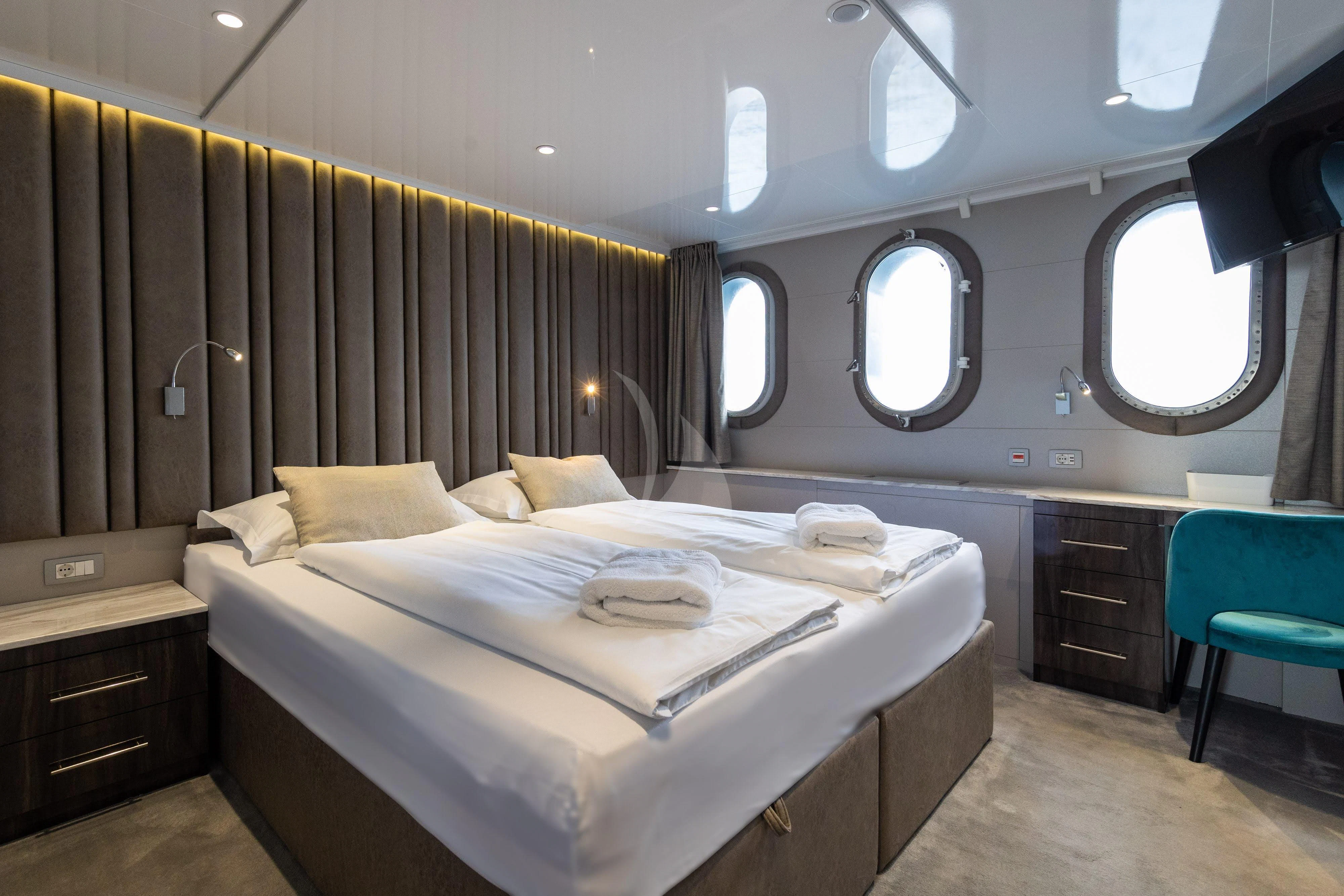 a bed in a room aboard LADY ELEGANZA Yacht for Sale