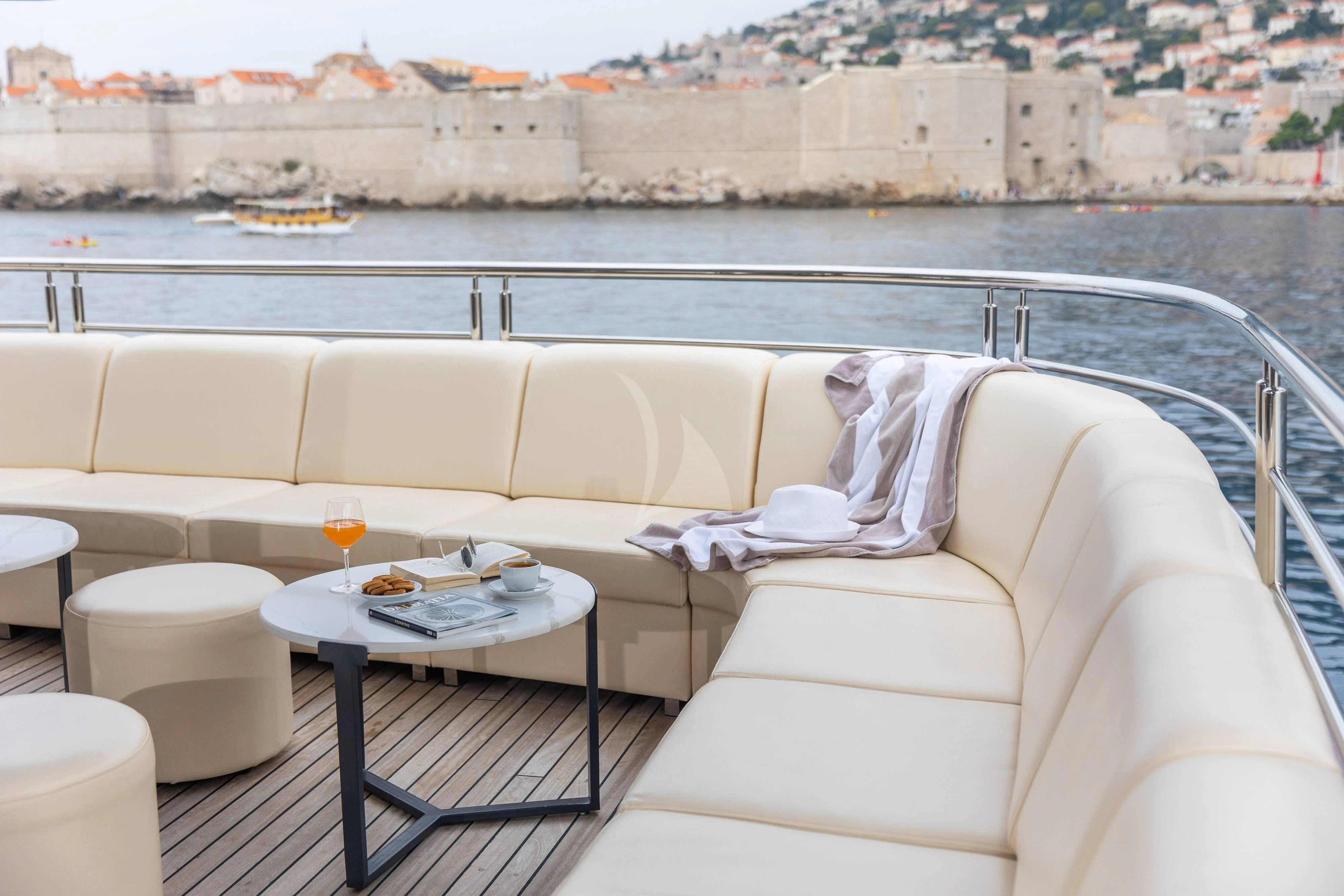 a person sleeping on a couch aboard LADY ELEGANZA Yacht for Sale