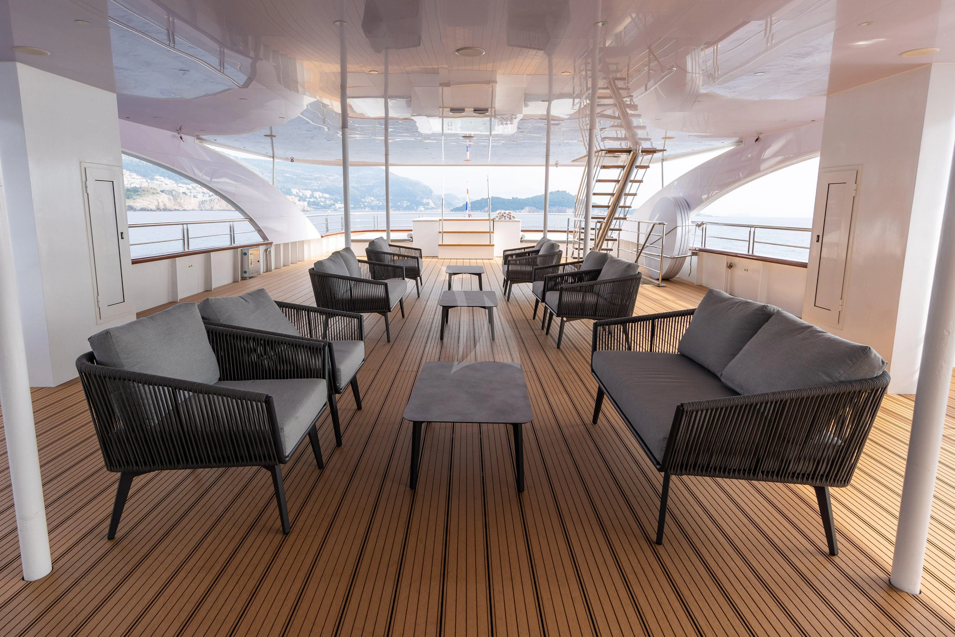 a room with a couch and a ladder aboard LADY ELEGANZA Yacht for Sale