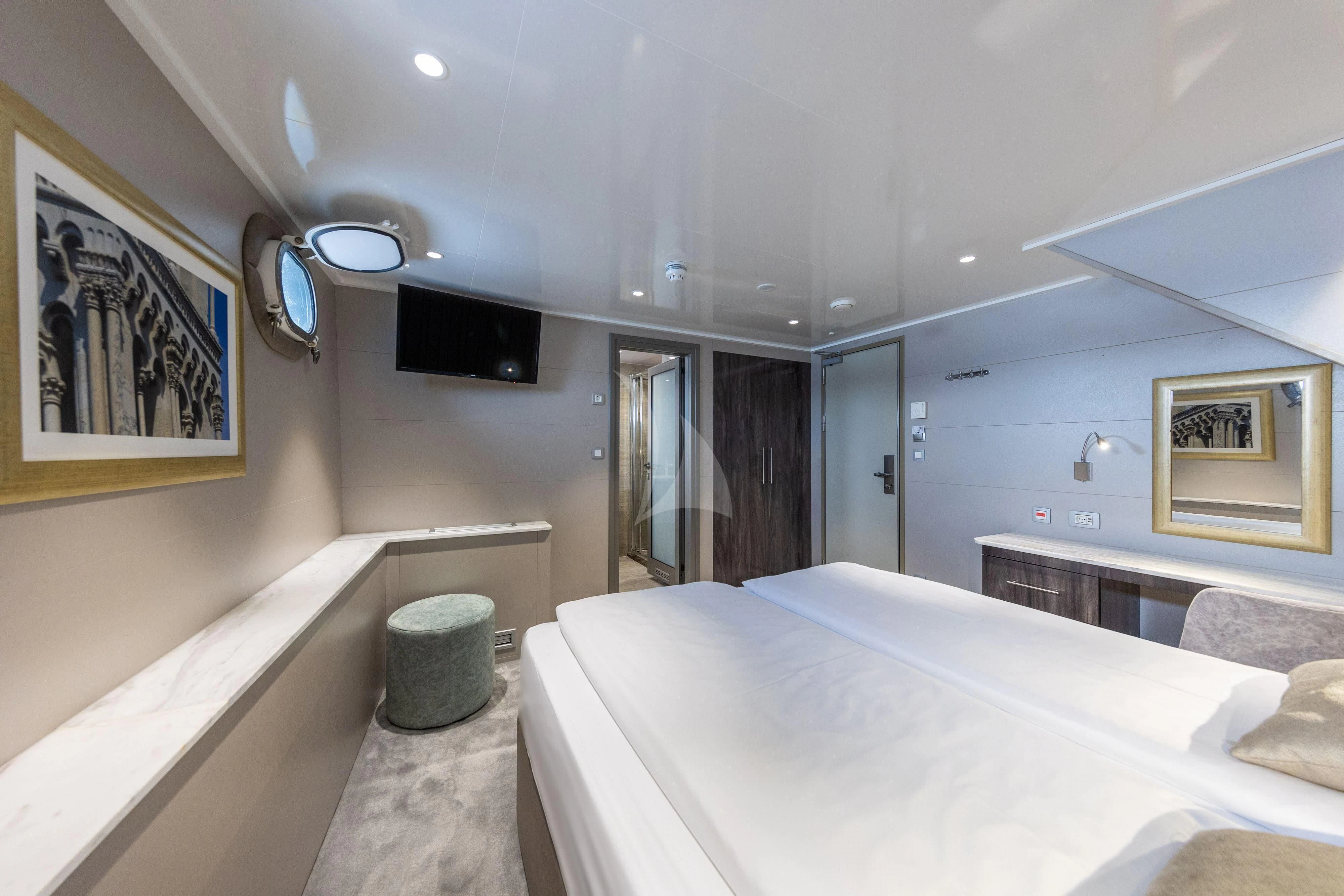 a large bedroom with a large bed aboard LADY ELEGANZA Yacht for Sale