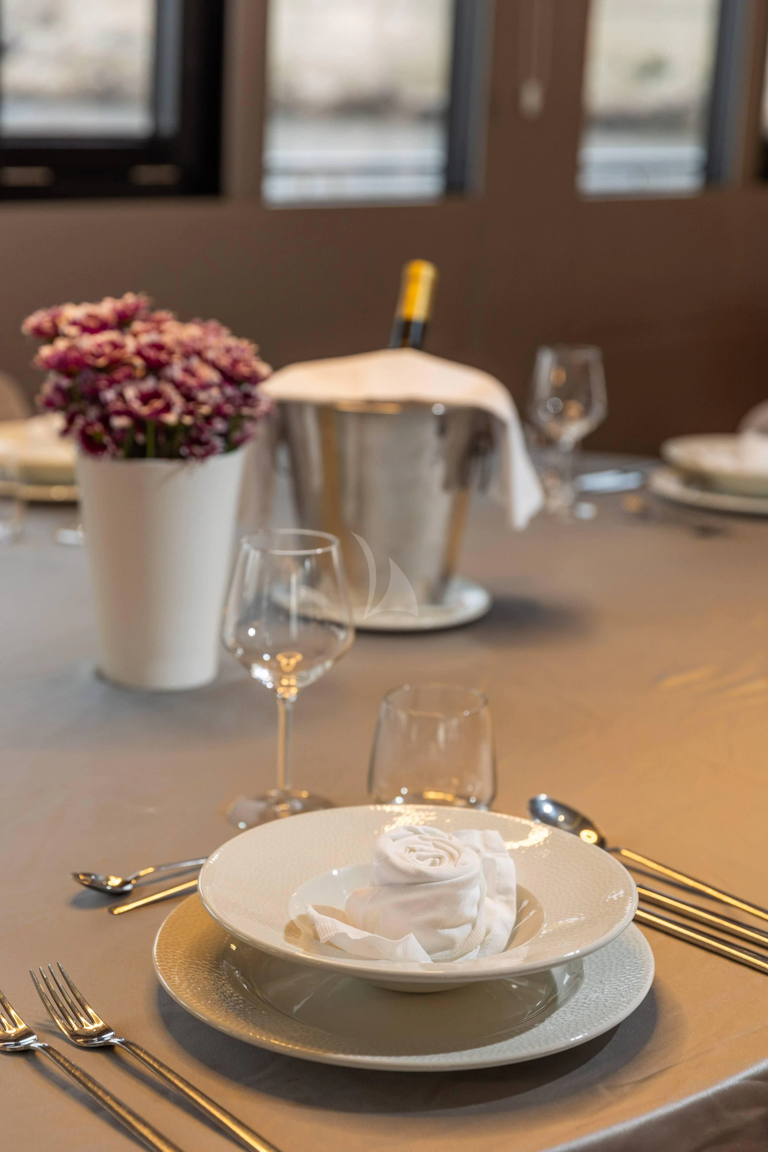 a plate of dessert on a table aboard LADY ELEGANZA Yacht for Sale