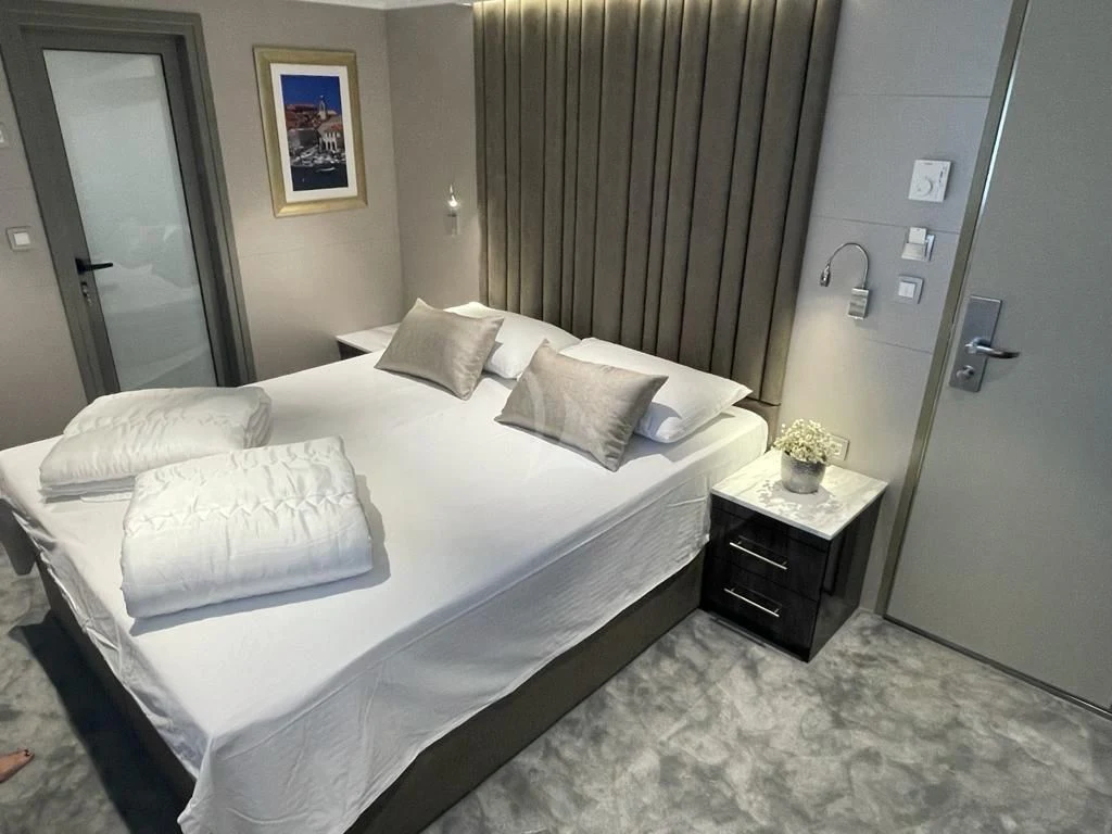 a bed in a hotel room aboard LADY ELEGANZA Yacht for Sale