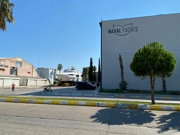 a building with a sign on the side aboard PROJECT CAVALLI Yacht for Sale
