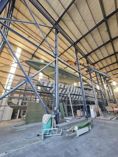 a large warehouse with several racks aboard PROJECT CAVALLI Yacht for Sale