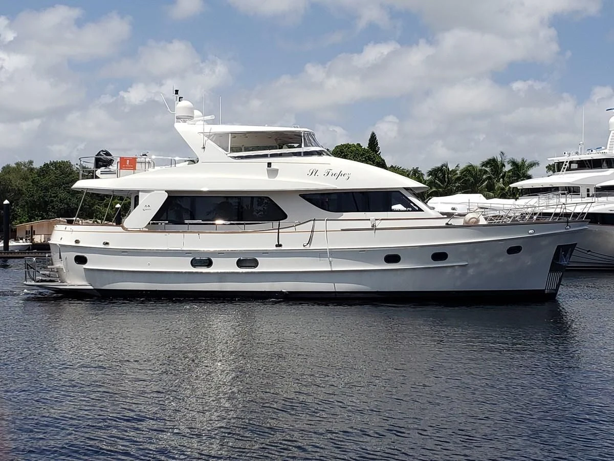 a white yacht in the water aboard ST. TROPEZ Yacht for Sale