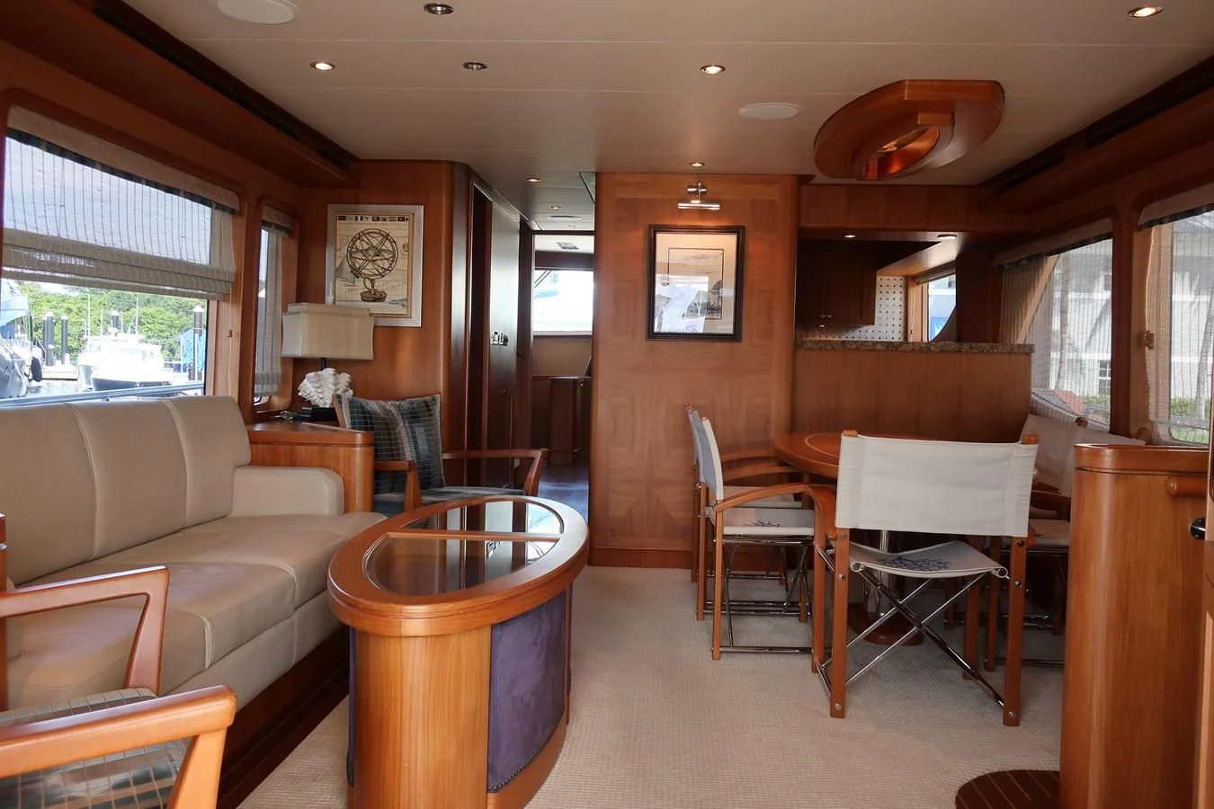 a living room with a couch and a table aboard ST. TROPEZ Yacht for Sale